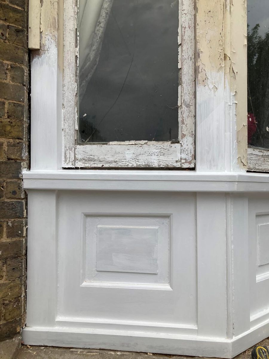 The same bay corner rebuilt and painted