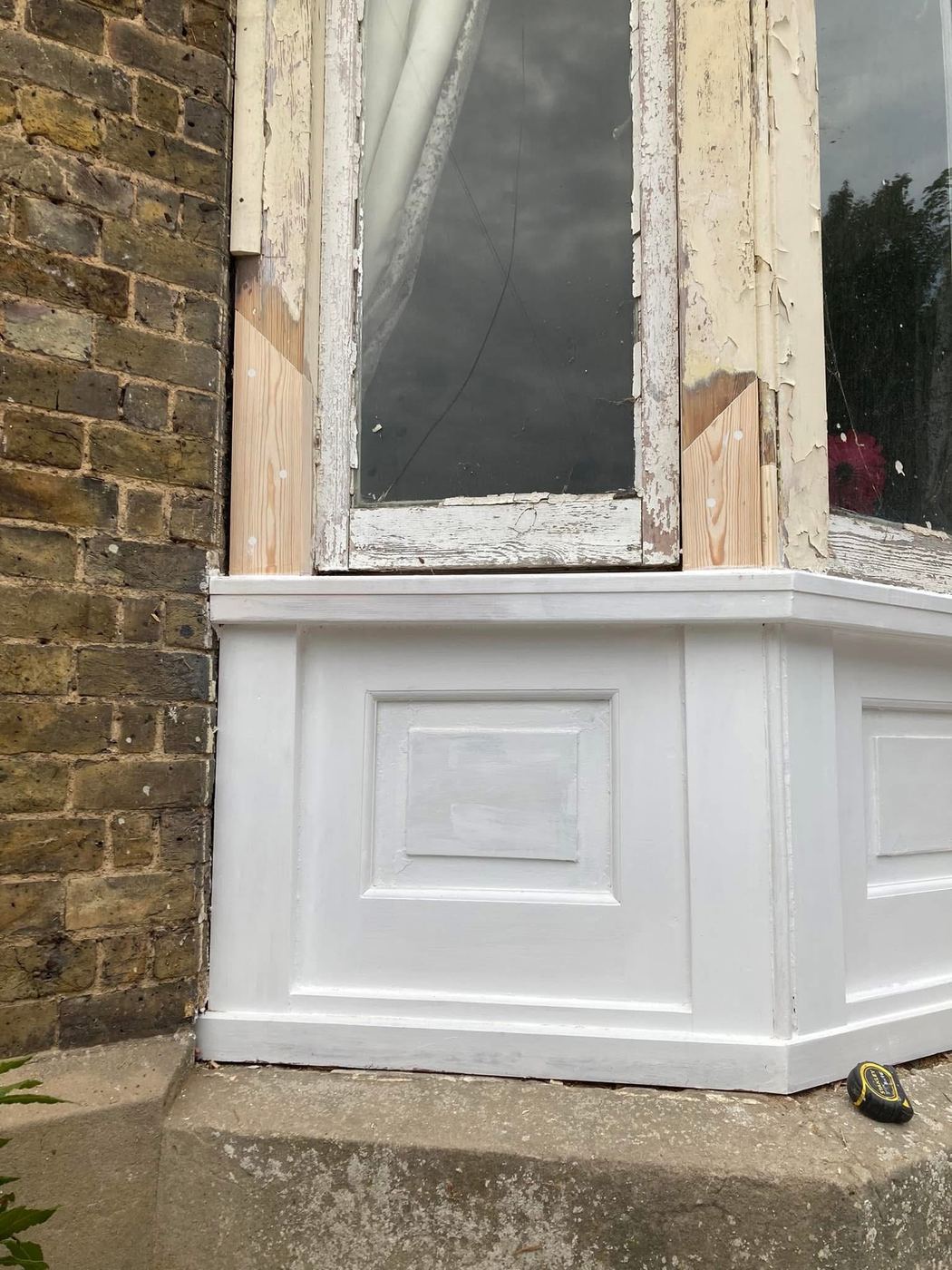 Bay window panelling finished and painted white