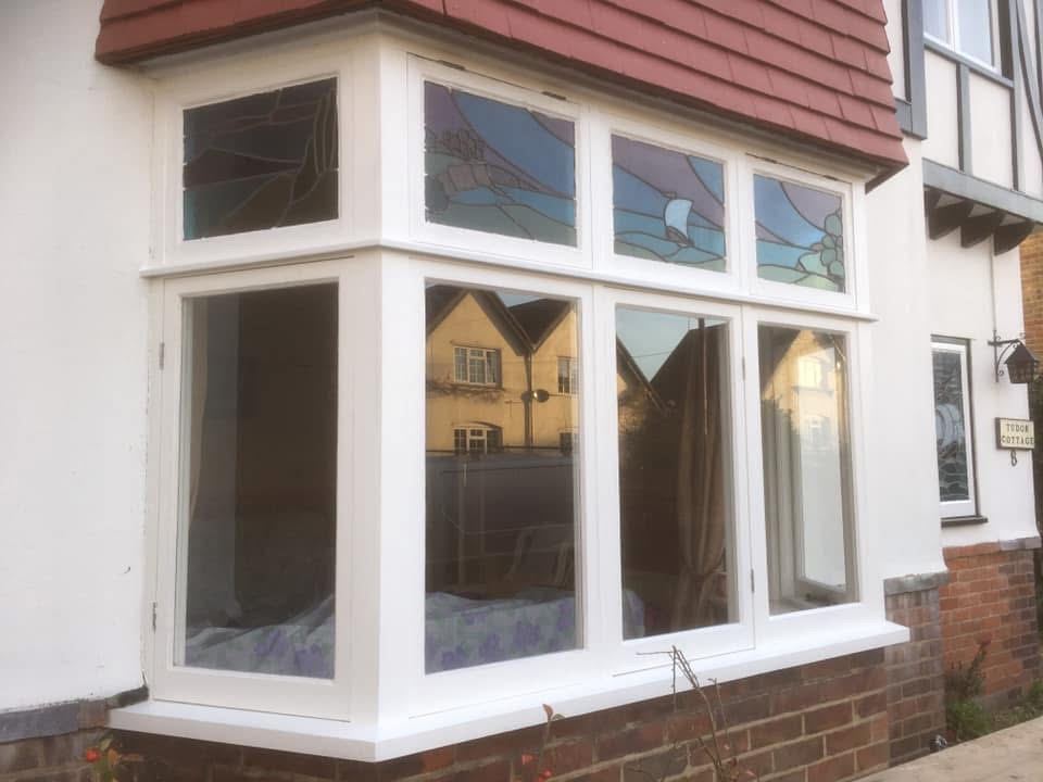 New timber bay window fitted and painted white